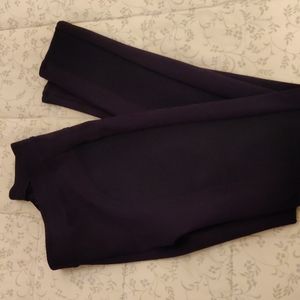 NUE navy leggings. Elastic waist. Beautiful details from hip down. Like new.